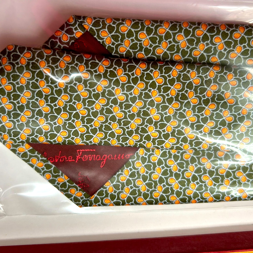 Brand new, unopened 100% Silk Salvatore Ferragamo tie.